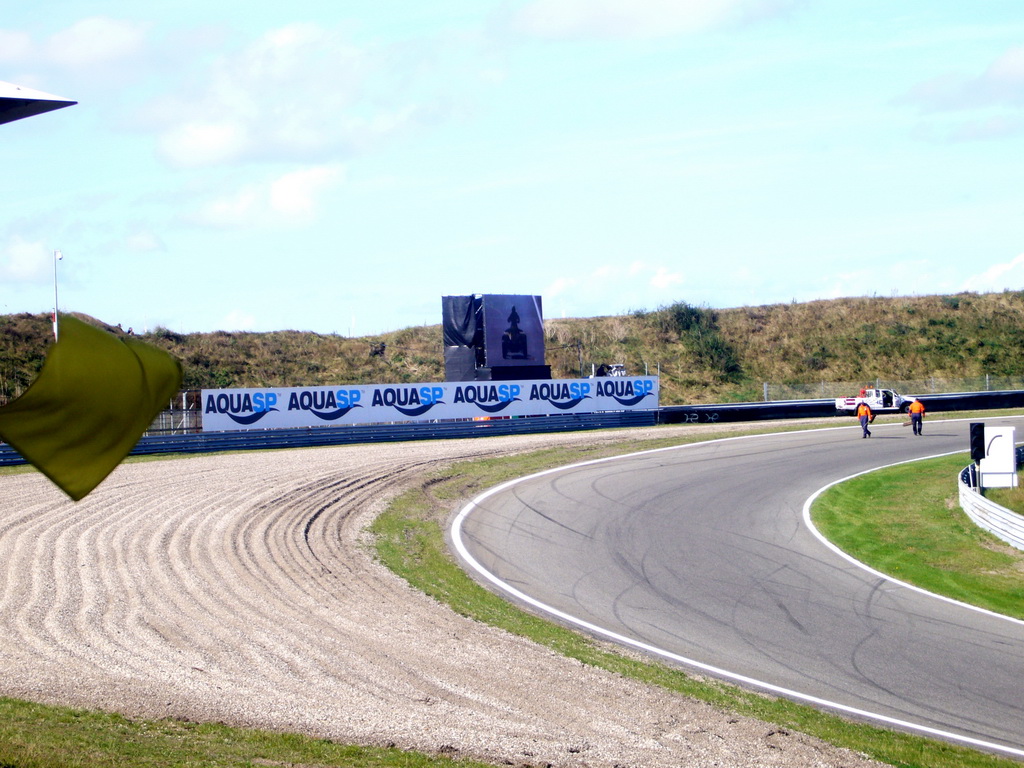 Yellow flag being waved at Circuit Zandvoort, during the break of the 2007-08 Dutch A1 Grand Prix of Nations