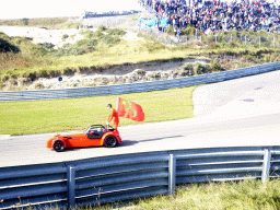 Old race car with Cong Fu Cheng and the Chinese flag at Circuit Zandvoort, before the Main Race of the 2007-08 Dutch A1 Grand Prix of Nations