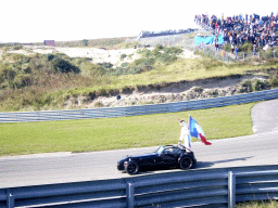 Old race car with Loïc Duval and the French flag at Circuit Zandvoort, before the Main Race of the 2007-08 Dutch A1 Grand Prix of Nations
