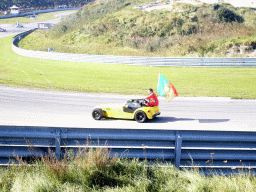 Old race car with João Urbano and the Portuguese flag at Circuit Zandvoort, before the Main Race of the 2007-08 Dutch A1 Grand Prix of Nations