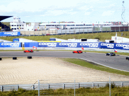 Old race cars with drivers and flags, before the Main Race of the 2007-08 Dutch A1 Grand Prix of Nations