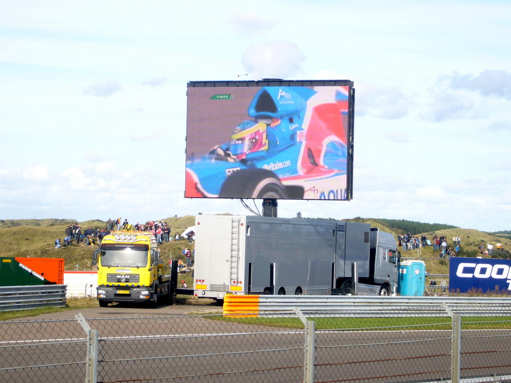 Screen with the A1 race car with Oliver Jarvis at Circuit Zandvoort, just after winning the Main Race of the 2007-08 Dutch A1 Grand Prix of Nations