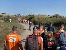 Fans walking through the dunes to Circuit Zandvoort