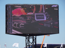 TV screen with the Formula 1 car of Max Verstappen in the pit box at Circuit Zandvoort, viewed from the Eastside Grandstand 3, during the Formula 1 Free Practice 3