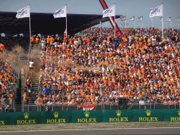 Orangs smoke at the Arena Grandstand 1 at Circuit Zandvoort, viewed from the Eastside Grandstand 3, during the Formula 1 Qualification Session 1