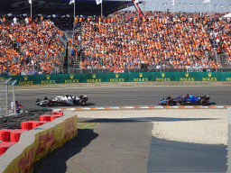 Formula 1 cars of Yuki Tsunoda and Alexander Albon at the Hans Ernst Chicane at Circuit Zandvoort, viewed from the Eastside Grandstand 3, during the Formula 1 Qualification Session 1