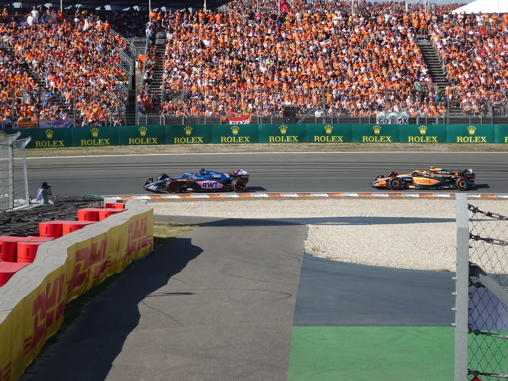 Formula 1 cars of Fernando and Lando Norris at the Hans Ernst Chicane at Circuit Zandvoort, viewed from the Eastside Grandstand 3, during the Formula 1 Qualification Session 2