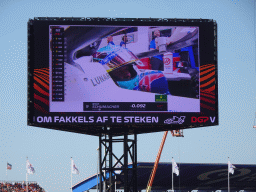 TV screen with Mick Schumacher at the pit box at Circuit Zandvoort, viewed from the Eastside Grandstand 3, right after the Formula 1 Qualification Session 2