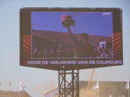 TV screen with Max Verstappen at the main straight at Circuit Zandvoort, viewed from the Eastside Grandstand 3, right after the Formula 1 Qualification Session 3
