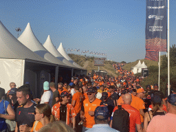 Fans walking along the Eastside Grandstands at Circuit Zandvoort, right after the Formula 2 Sprint Race