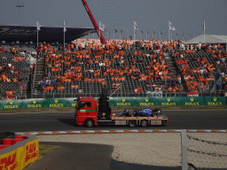 Formula 2 car of Logan Sargeant being driven away after an accident at the Hans Ernst Chicane at Circuit Zandvoort, viewed from the Eastside Grandstand 3, during the Formula 2 Feature Race