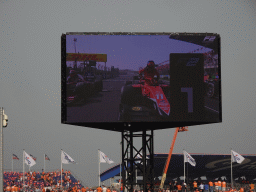 TV screen with Felipe Drugovich, Richard Verschoor and Ayumu Iwasa getting out of their Formula 2 cars at the main straight at Circuit Zandvoort, viewed from the Eastside Grandstand 3, right after the Formula 2 Feature Race