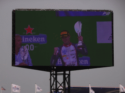 TV screen with Richard Verschoor at the main stage at Circuit Zandvoort, viewed from the Eastside Grandstand 3, during the podium ceremony of the Formula 2 Feature Race