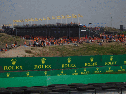 Fans at the General Admission 2 between turn 13 and the Arie Luyendyk corner at Circuit Zandvoort, during the Porsche Mobil 1 Supercup Race