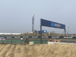 Porsche Mobil 1 Supercup cars of Dylan Pereira and Larry ten Voorde at the Hunserug straight at Circuit Zandvoort, viewed from the area with the Arena Grandstands, during the Porsche Mobil 1 Supercup Race