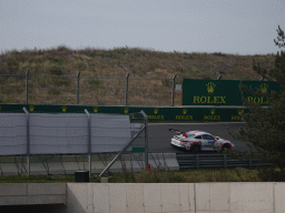 Porsche Mobil 1 Supercup car of Lorcan Hanafin at the Arie Luyendyk corner at Circuit Zandvoort, viewed from near the tunnel under the road, during the Porsche Mobil 1 Supercup Race