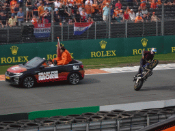 Stuntman on a motorcycle and entertainers at the Hans Ernst Chicane at Circuit Zandvoort, viewed from the Eastside Grandstand 3, during the Showteam Promotor Activity