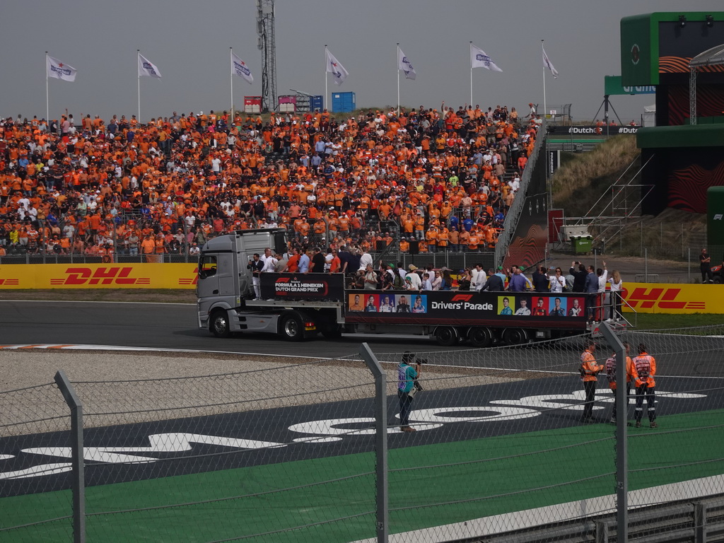 Truck with people at the Hans Ernst Chicane at Circuit Zandvoort, viewed from the Eastside Grandstand 3, at the start of the Formula 1 Drivers` Parade