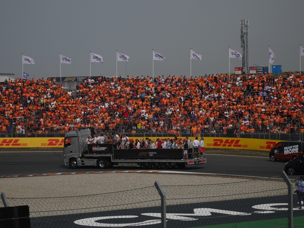 Truck with people at the Hans Ernst Chicane at Circuit Zandvoort, viewed from the Eastside Grandstand 3, at the start of the Formula 1 Drivers` Parade