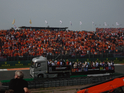 Truck with people at the Hans Ernst Chicane at Circuit Zandvoort, viewed from the Eastside Grandstand 3, at the start of the Formula 1 Drivers` Parade