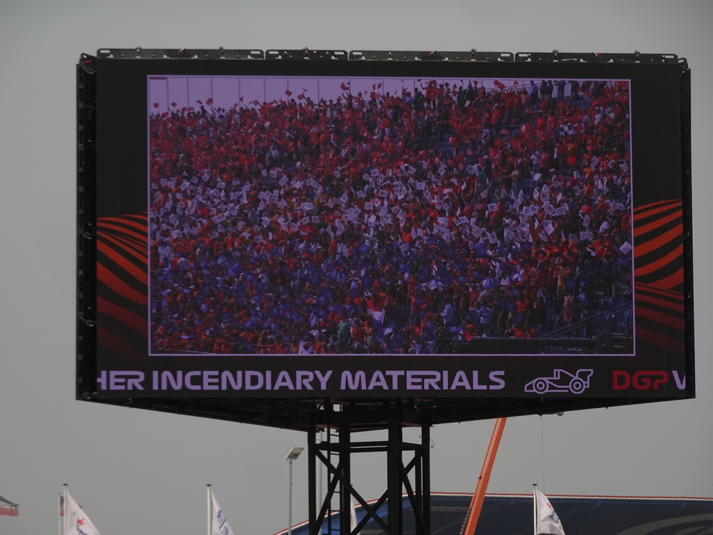 TV screen with Dutch fans at the main straight at Circuit Zandvoort, viewed from the Eastside Grandstand 3, during the Formula 1 Drivers` Parade