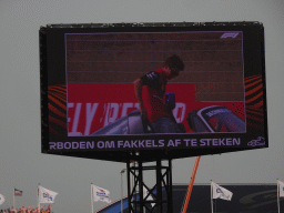 TV screen with Charles Leclerc at Circuit Zandvoort, viewed from the Eastside Grandstand 3, during the Formula 1 Drivers` Parade