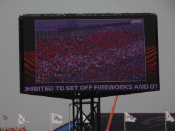 TV screen with Dutch fans at the main straight at Circuit Zandvoort, viewed from the Eastside Grandstand 3, during the Formula 1 Drivers` Parade