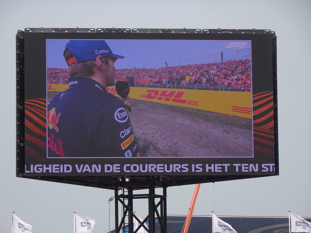 TV screen with Max Verstappen at the Hans Ernst Chicane at Circuit Zandvoort, viewed from the Eastside Grandstand 3, during the Formula 1 Drivers` Parade