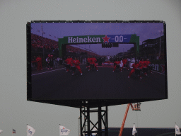 TV screen with drummers at the main straight at Circuit Zandvoort, viewed from the Eastside Grandstand 3, during the pre-race show of the Formula 1 Race