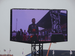 TV screen with Max Verstappen and the other Formula 1 drivers with the Formula 1 Heineken Dutch Grand Prix 2022 trophy at the main straight at Circuit Zandvoort, viewed from the Eastside Grandstand 3, during the pre-race show of the Formula 1 Race
