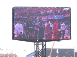 TV screen with Formula 1 drivers at the main straight at Circuit Zandvoort, viewed from the Eastside Grandstand 3, during the pre-race show of the Formula 1 Race