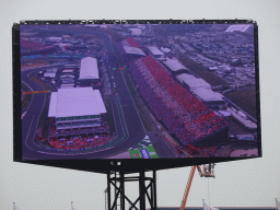 TV screen with Dutch fans at the main straight at Circuit Zandvoort, viewed from the Eastside Grandstand 3, just before the Formula 1 Race