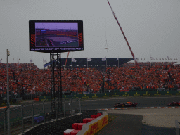 Formula 1 cars of Max Verstappen and Charles Leclerc at the Hans Ernst Chicane at Circuit Zandvoort, viewed from the Eastside Grandstand 3, during the formation lap of the Formula 1 Race