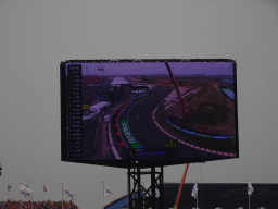 TV screen with the Formula 1 cars of George Russell, Charles Leclerc, Carlos Sainz, Sergio Perez, Fernando Alonso and Lando Norris at Circuit Zandvoort, viewed from the Eastside Grandstand 3, during the Formula 1 Race