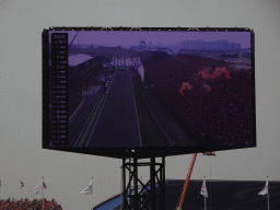 TV screen with the Formula 1 car of Max Verstappen crossing the finish line at the main straight at Circuit Zandvoort, viewed from the Eastside Grandstand 3, during the Formula 1 Race