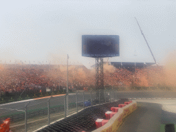 Orange smoke at the Hans Ernst Chicane at Circuit Zandvoort, viewed from the Eastside Grandstand 3, right after the Formula 1 Race