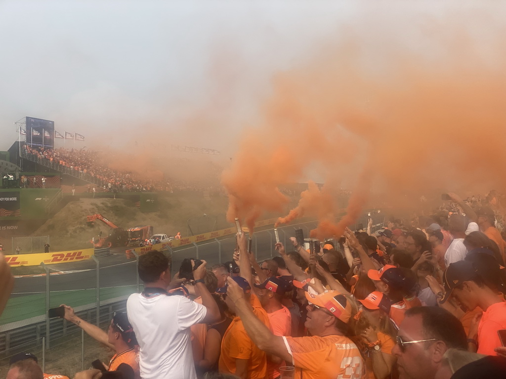 Orange smoke at the Eastside Grandstand 3 at Circuit Zandvoort, right after the Formula 1 Race