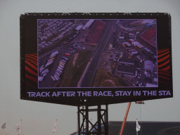 TV screen with the main straight at Circuit Zandvoort, viewed from the Eastside Grandstand 3, right after the Formula 1 Race