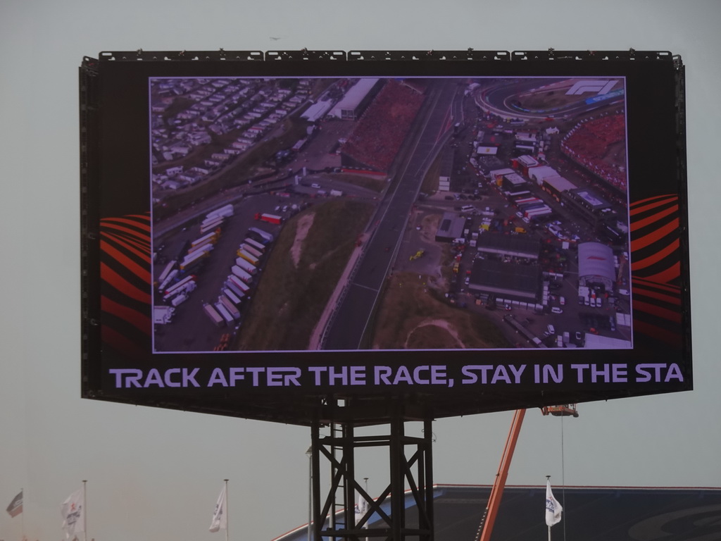 TV screen with the main straight at Circuit Zandvoort, viewed from the Eastside Grandstand 3, right after the Formula 1 Race