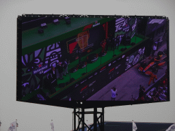 TV screen with George Russell, Charles Leclerc and Max Verstappen at the main stage at Circuit Zandvoort, viewed from the Eastside Grandstand 3, during the podium ceremony of the Formula 1 Race