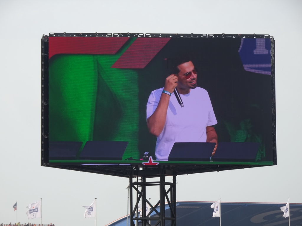 TV screen with Afrojack at the main stage at Circuit Zandvoort, viewed from the Eastside Grandstand 3, during the post-race show of the Formula 1 Race