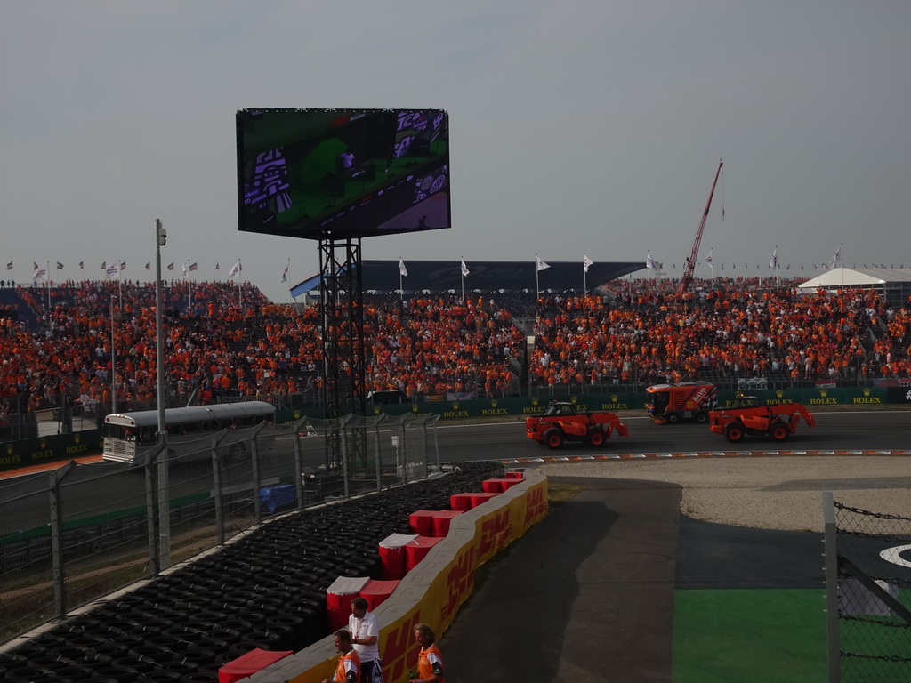 Bus and other vehicles at the Hans Ernst Chicane at Circuit Zandvoort, viewed from the Eastside Grandstand 3, during the post-race show of the Formula 1 Race