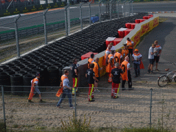 Stewards and fans at the Hans Ernst Chicane at Circuit Zandvoort, viewed from the Eastside Grandstand 3, during the post-race show of the Formula 1 Race