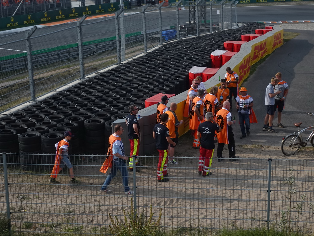 Stewards and fans at the Hans Ernst Chicane at Circuit Zandvoort, viewed from the Eastside Grandstand 3, during the post-race show of the Formula 1 Race