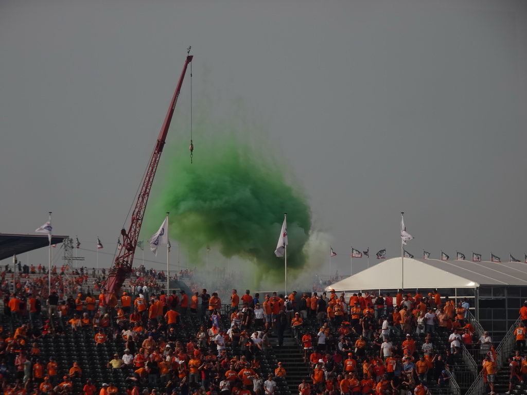 Green smoke at the Hans Ernst Chicane at Circuit Zandvoort, viewed from the Eastside Grandstand 3, during the post-race show of the Formula 1 Race