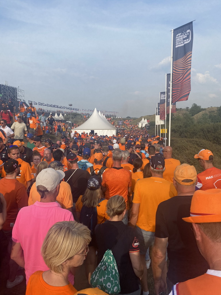 Fans walking from the Eastside Grandstands at Circuit Zandvoort to the parking lots, during the post-race show of the Formula 1 Race