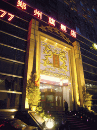 Front of the massage saloon in the city center, by night