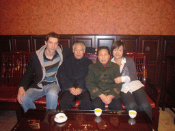 Tim, Miaomiao and Miaomiao`s grandparents in a restaurant in the city center