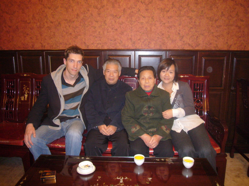 Tim, Miaomiao and Miaomiao`s grandparents in a restaurant in the city center