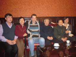 Tim, Miaomiao and Miaomiao`s parents and grandparents in a restaurant in the city center